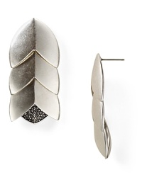 Giles and Brother's sinuous silver-plated earrings are an edgy-glam statement. Whether dressed down or to the nines, this sculptural pair will turn heads.