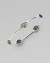 Pretty labradorite cabochons set in sterling silver. LabradoriteSterling silverSlip-on styleDiameter, about 2¾Imported 