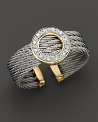 A yellow gold and stainless steel round ring with diamonds. Designed by Charriol.