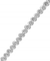 Embrace your elegant side. Victoria Townsend's bracelet, set in sterling silver, offers a radiant look with round-cut diamonds (1/4 ct. t.w.) only enhancing the luster. Approximate length: 7 inches.