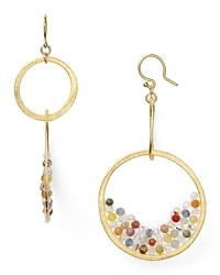 Multi colored stones and striking crystals take these dangly hoop earrings from Chan Luu from simple to stunning. Like her signature wrap bracelets, this pair lends an effortless dose of eclectic beauty.