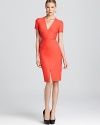 A vibrant Zac Posen dress flaunts sleek lines and and unique starburst seam detail in the designer's signature standout style.