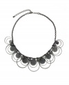 Well rounded: Sandblast paillettes and beaded accents create a chic circular design on this necklace from Style&co. Crafted in hematite tone mixed metal. Approximate length: 16 inches + 3-1/2 inch extender. Approximate drop: 4-1/2 inches.