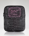 The writing is on this neoprene MARC BY MARC JACOBS case, which is cleverly constructed to conceal (and protect) your iPad.