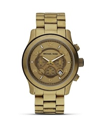 Adopt a sporty approach to accessorizing with this athletic-inspired watch from MICHAEL Michael Kors. With an oversized bezel and bold markers, it's ready for urban adventures.