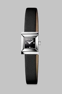 The ultimate day-to-evening design, with a diamond-punctuated bezel, features an elegant satin strap. G-frame stainless steel case, 18mm x 14mm (.70 x .55) Bevel-edged sapphire glass Black lacquered dial set with diamonds Black satin strap Made in Switzerland 