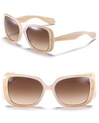 Glam it up in these rounded vintage-inspired frames by Miu Miu.