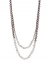 Classic elegance. This two-row necklace from Kenneth Cole New York is crafted from silver-tone mixed metal with taupe glass pearls and beads combining for a stunning look. Approximate length: 31 inches + 3-inch extender. Item comes packaged in a signature Kenneth Cole New York Gift Box. Approximate drop: 2-1/2 inches.