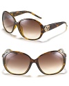 Classic sunglasses with a playful twist on the Gucci logo.