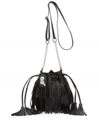 Flexible fringe: you can pair this fresh Carlos by Carlos Santana handbag with cowboy boots or sky-high stilettos.