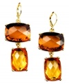 Drops of jupiter. These soothing earrings by AK Anne Klein feature a double pendant design in rectangular, topaz-color glass beads. Crafted in gold tone mixed metal. Approximate drop: 2 inches.