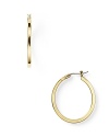 Simple and chic, Lauren Ralph Lauren's gleaming hoop earrings bring classic style to your look.