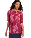 A pretty paisley print and a dainty ribbon belt create a charming effect on this petite tunic from Charter Club. (Clearance)