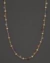 Beautiful multi-colored semi precious stones highlight this delicate 18K yellow gold necklace.