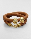 Two iconic, crystal accented skull beads on a luxurious, wrapped leather cord. Leather cordGoldtone brassCrystalsLength, about 14Lobster clasp closureMade in Italy