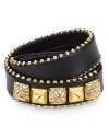 Punk-inspired style finds its pretty side with this edgy black leather wrap bracelet from Juicy Couture, which is detailed with gleaming pyramid studs.