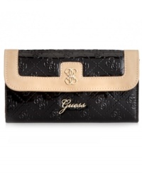 A pretty patent look that brings the shine. This slim clutch design from GUESS keeps your essentials organized in chic style. Ideal for the everyday.