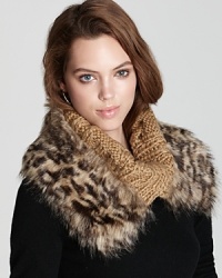 A luxurious look from MICHAEL Michael Kors, this fold-over neckwarmer is accented with faux cheetah fur and logo buttons.