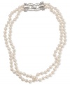 Unmatched elegance. Carolee's double-row necklace is crafted from silver-tone mixed metal with glass pearls adding a look that's both refined and resplendent. Approximate length: 17 inches. Approximate drop: 1/4 inch.