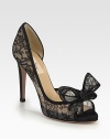 Intricately crafted, semi-sheer lace silhouette with a skinny heel, peep toe and divine bow adornment. Self-covered heel, 4 (100mm)Semi-sheer lace upperLeather lining and solePadded insoleMade in Italy