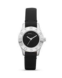 Perfect playful accessorizing with this watch from MARC BY MARC JACOBS. With a soft matte black leather band and logo-engraved bezel, this piece has style-setter written all over it.