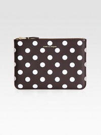 A secure zip pouch in a fun and whimsical polka dot printed leather.Top zip closureFully lined8¾W X 6¼H X ½DImported