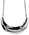 Heavy metal. Add a chic, contemporary twist to your wardrobe with Nine West's striking bib statement necklace. Set in silver tone mixed metal. Approximate length: 16 inches.