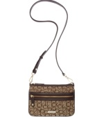 Signature jacquard distinguishes the crossbody purse by Calvin Klein. Remove the strap to carry it as a clutch.