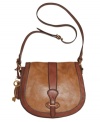 Grab hold of great style with this vintage-inspired flap bag from Fossil. A saddle silhouette, goldtone hardware and a signature key charm add the perfect finishing touches to this unique design.