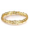 Stackable bangles from Gorjana in 18-karat gold vermeil are a delicate touch - now imagine how they stand out featuring delicate dot details.