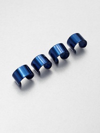 Finished in a deep shade of blue, these strikingly simple, flexible open bands can be worn on one or both hands in any combinations you choose.BrassPlasticWidth, about .75Made in Italy