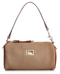 Petite yet surprisingly spacious, this adorable design by Dooney & Bourke is perfect for stashing wallet, phone, keys and makeup without a worry. Soft, supple leather is accented with contrasting trim and slender strap, while plenty of pockets organize the interior.