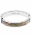 You're a natural. A neutral-colored acetate horn inlay defines this sophisticated bangle by Michael Kors. Crafted in silver tone mixed metal with a slip-on hinge clasp. Approximate diameter: 2-1/4 inches. Approximate bangle width: 3/8 inch.