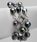 From the Midnight Pearl Collection. Blackened sterling silver cable & quatrefoil links are the prefect accent to these spectacular Tahitian pearls accented with brilliant diamonds. 11mm Tahitian pearlsDiamonds, .2 tcwBlackened sterling silverLength, about 7½Toggle closureImported 