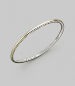 From the Cable Bangle collection. A smooth 18k gold exterior meets a cabled sterling silver interior on this truly unique bracelet. 18k yellow gold Sterling silver Diameter, about 2½ Imported