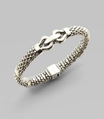 From the Derby Collection. A beautifully textured piece with an elegant stylized center link. Sterling silver Signature box clasp closure Diameter, about 2¼ Imported 