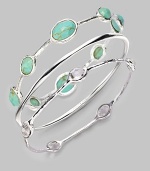 From the Silver Wonderland Collection. Richly veined, faceted ovals of bright turquoise are set all around a graceful sterling silver bangle. Turquoise Sterling silver Diameter, about 2½ Imported