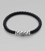 From the Weave Collection. Woven rubber is accented with an intricately engraved silver clasp.Sterling silver Rubber Width, about 5.5mm Length, about 7 Chevron clasp closure Imported