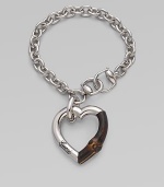 From the Bamboo Collection. A study in contrasts with this sterling silver and bamboo heart charm on a rolo chain. Sterling silver Lenth, about 7¼ Pendant width, about 2 Lobster clasp closure Made in Italy 