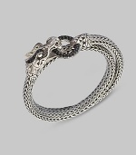 EXCLUSIVELY AT SAKS. From the Naga Lava Collection. Signature dragon head with black sapphire pavé ring. Can be worn as a bracelet or a necklace.Black sapphire Sterling silver Length, about 15 Single width, about ¼ Hinge clasp closure Made in Bali 