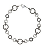 Wrap your wrists in chic, circular style. Judith Jack bracelet features glittering marcasite and crystals set in sterling silver. Approximate length: 7-1/4 inches.