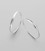 EXCLUSIVELY AT SAKS. Sophisticated hoops in polished sterling silver are subtly tapered from the middle. Sterling silver Diameter, about 2 Post back Imported