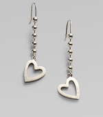 An open heart, etched with the Gucci name, dangles from a bold ball chain, crafted of polished sterling silver. Sterling silver Drop, about 2¼ Heart length, about ½ Ear wire Made in Italy