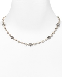 This charming necklace from Lauren Ralph Lauren features crystal stones and glass pearls.