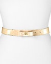 Tory Burch contours your look this season with this glossy patent leather belt, detailed with a polished bow.