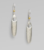 A unique design with tribal appeal in sleek sterling silver accented with radiant 24k gold. Sterling silver24k goldLength, about 1½Hook backImported 