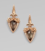 From the Superstud Collection. A glowing baroque setting, edged with diamonds, holds a faceted triangle of smoky quartz layered over mother-of-pearl for a soft, hazy effect in these elegant drops.Diamonds, .13 tcwSmoky quartz and white mother-of-pearlRose goldplated sterling silverLength, about 1¾Post-and-hinge back with 14k gold postImported