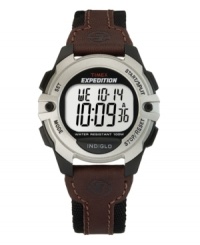 Hit the trail or the track with this rugged Expedition watch by Timex. Brown leather and black canvas strap with round black and silver resin case. Silver tone digital display dial features initial time, day, date and seconds. Quartz movement. Water resistant to 100 meters. One-year limited warranty.