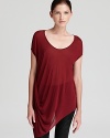 Draping lends simple elegance to this Helmut Lang tee with trend-right asymmetrical hem.