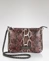 Slung over your shoulder or across your chest, Sam Edelman's signature snake pouch exudes sleek style.